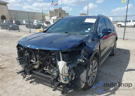 2021 Cadillac Xt4 Fwd Premium Luxury from USA, damaged, VIN 1GYFZCR47MF083284